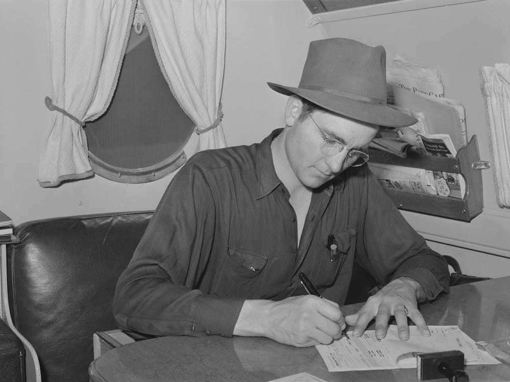 Camp Manager In Trailer Office At The Fsa (Farm Security Administration) Migratory Labor Camp Mobile Unit