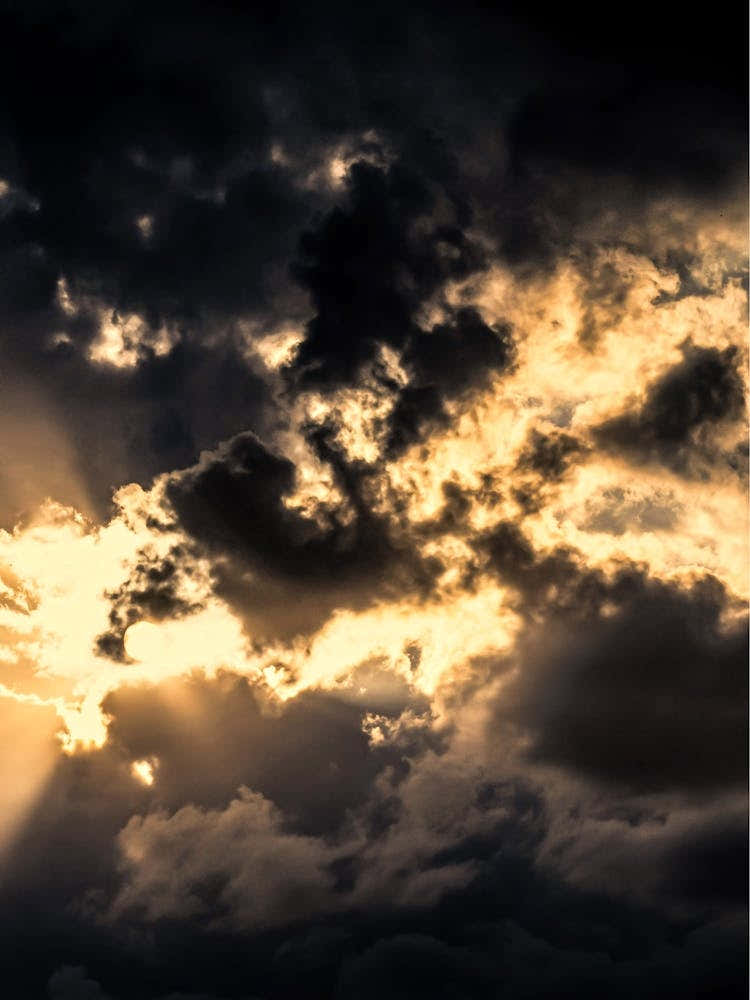 The Bright Sun Breaks Through The Dark Clouds 2