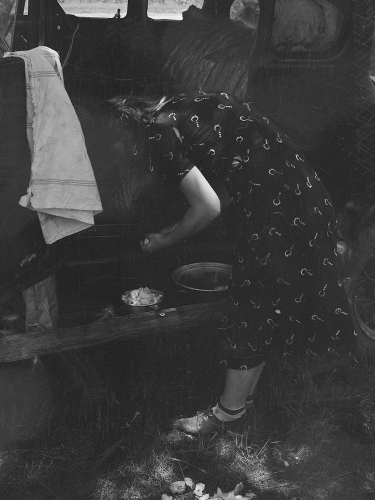 Untitled Photo, Possibly Related To Migrants Loading Rear Deck Of Automobile While Camped Near Prague,