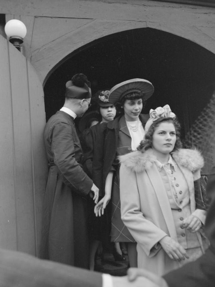 Shaking Hands With Members Of The Congregation After Easter Services At An Episcopal Church, South Side Of