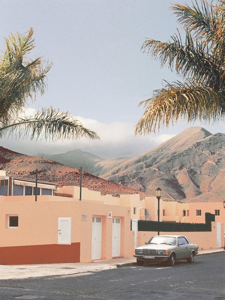Vintage Car With Mountains And Palm Trees