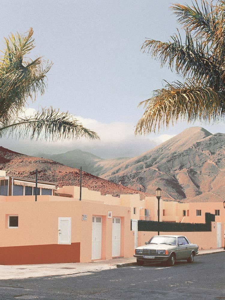 Vintage Car With Mountains And Palm Trees