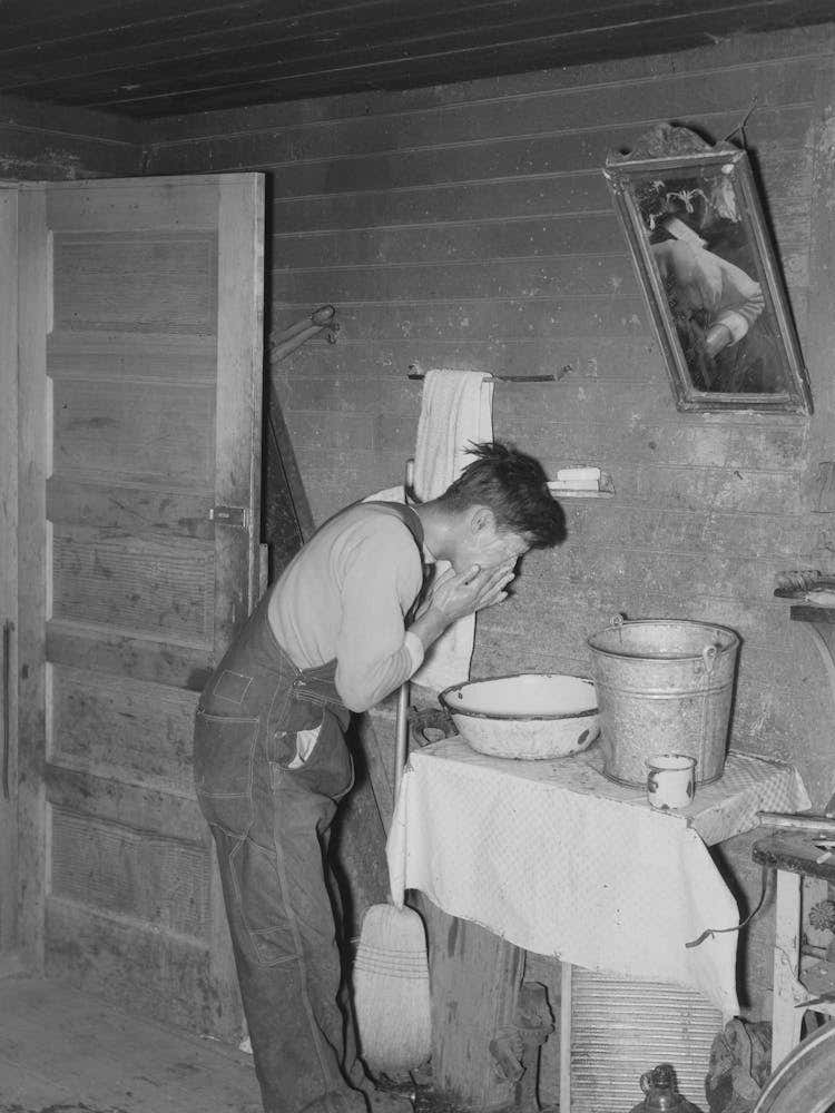 Mexican Beet Worker Washing Up After A Day S Work Near East Grand Forks, Minnesota By Russell Lee
