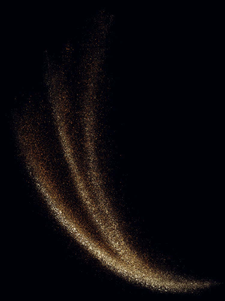 Gold Dust On Black Background