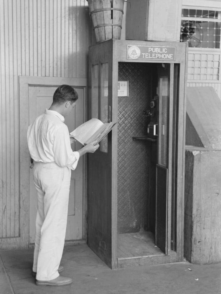 Man Looking Up Telephone Number, Streetcar Terminal, Oklahoma City, Oklahoma By Russell Lee