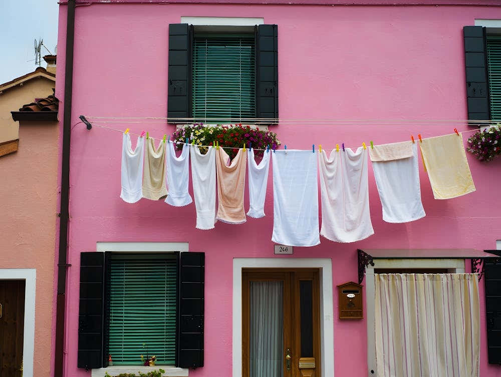 Burano, Italy Pink House Print - Vibrant Laundry Scene