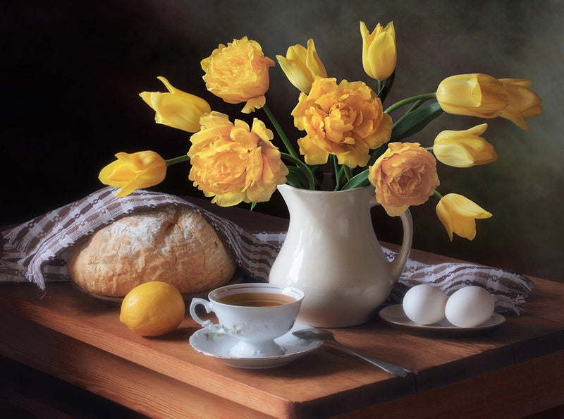 Still life with a bouquet of yellow tulips