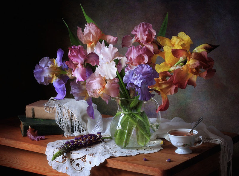 With a bouquet of irises
