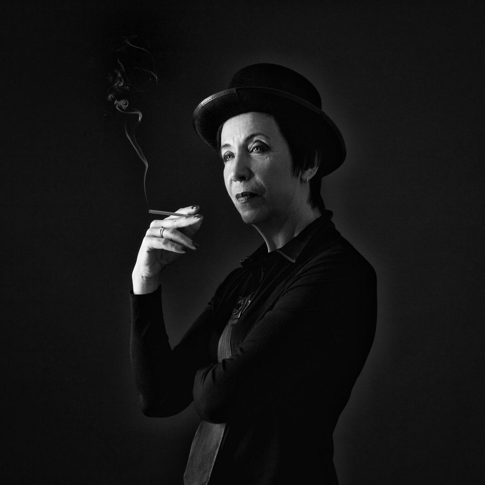 A woman with a cigarette.