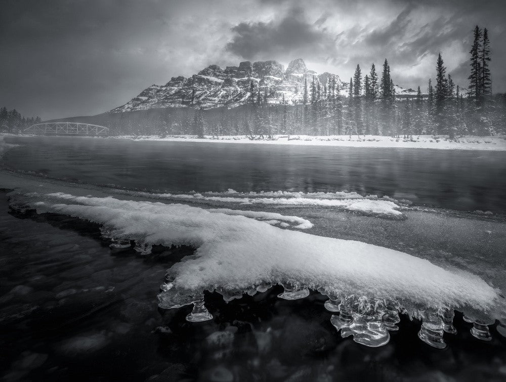 Melting River Flowing by Mountains