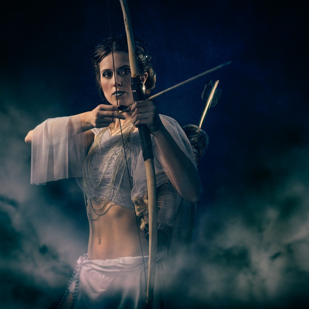 Greek goddess with bow and arrow.