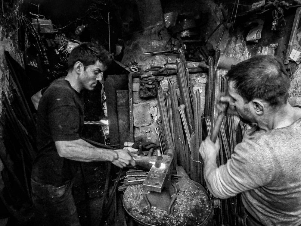 The traditional blacksmithing profession in the city of Mosul