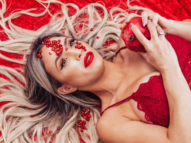 Woman with pomegranate