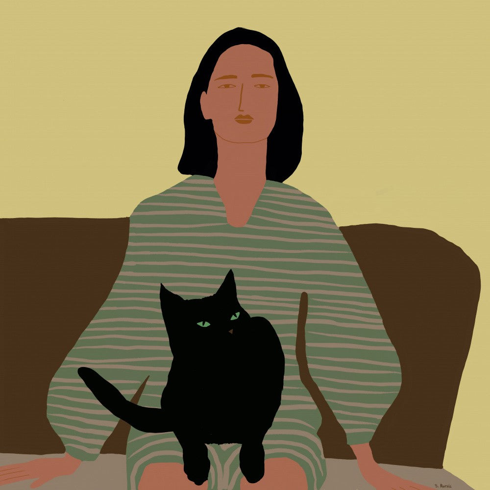 Lady sitting with black cat.