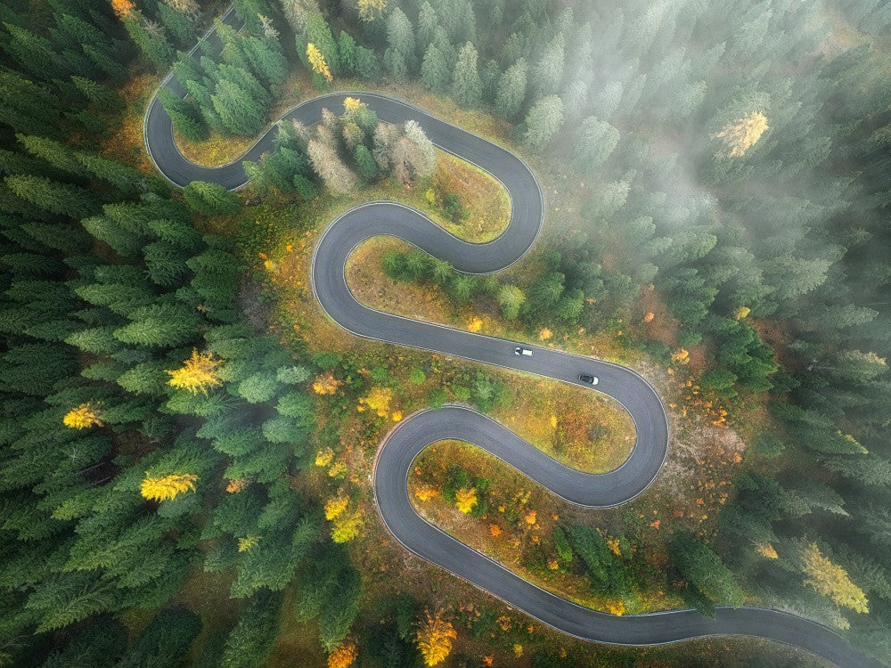 Snake-like Road in a Foggy Day