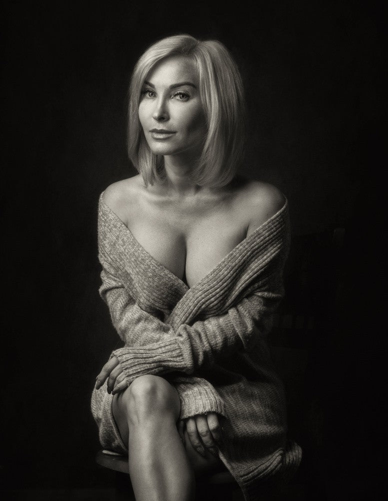 J.