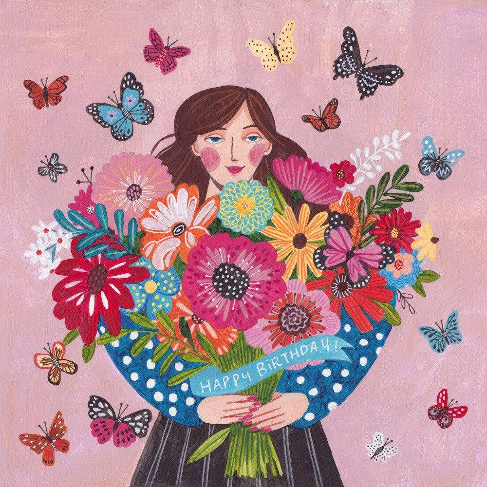 Femme avec un bouquet de fleurs