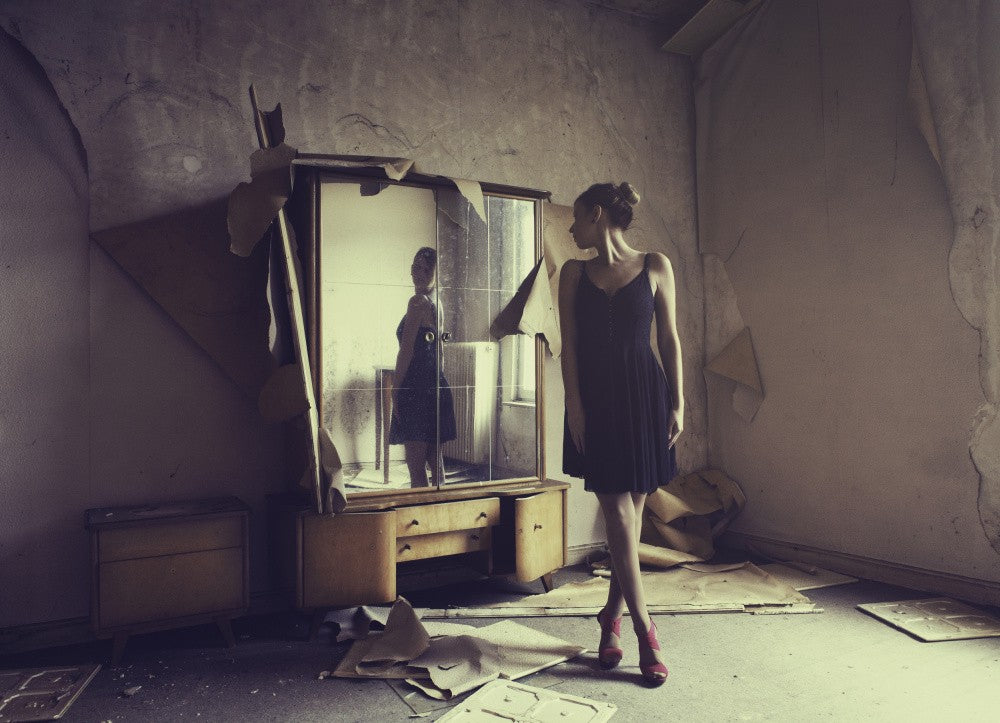 Girl in front of a mirror