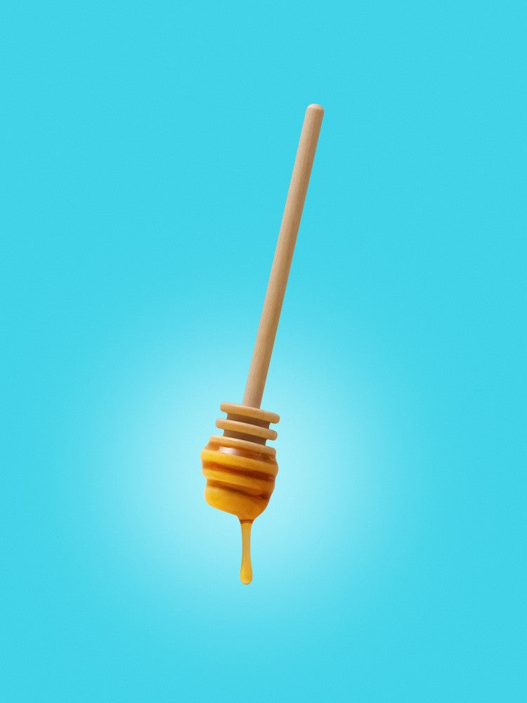 Honiglöffel mit Tropfen