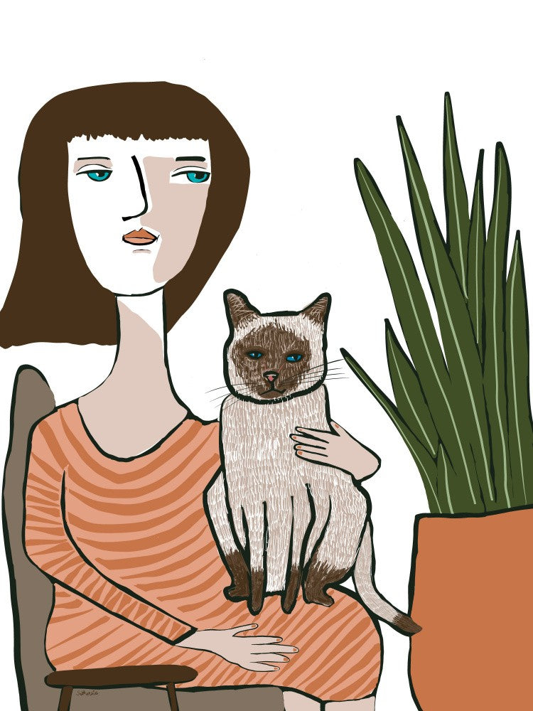Girl with Siamese cat