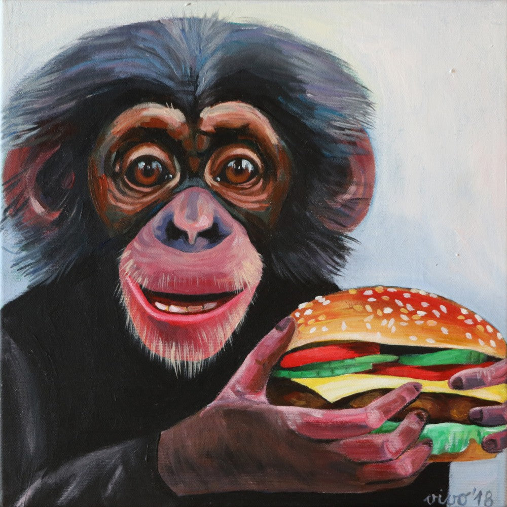 Monkey Holding A Hamburger