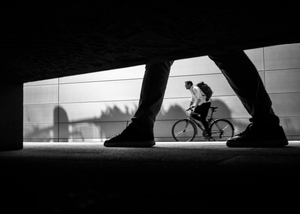 Caught in Motion: Legs, Feet, and a Bike