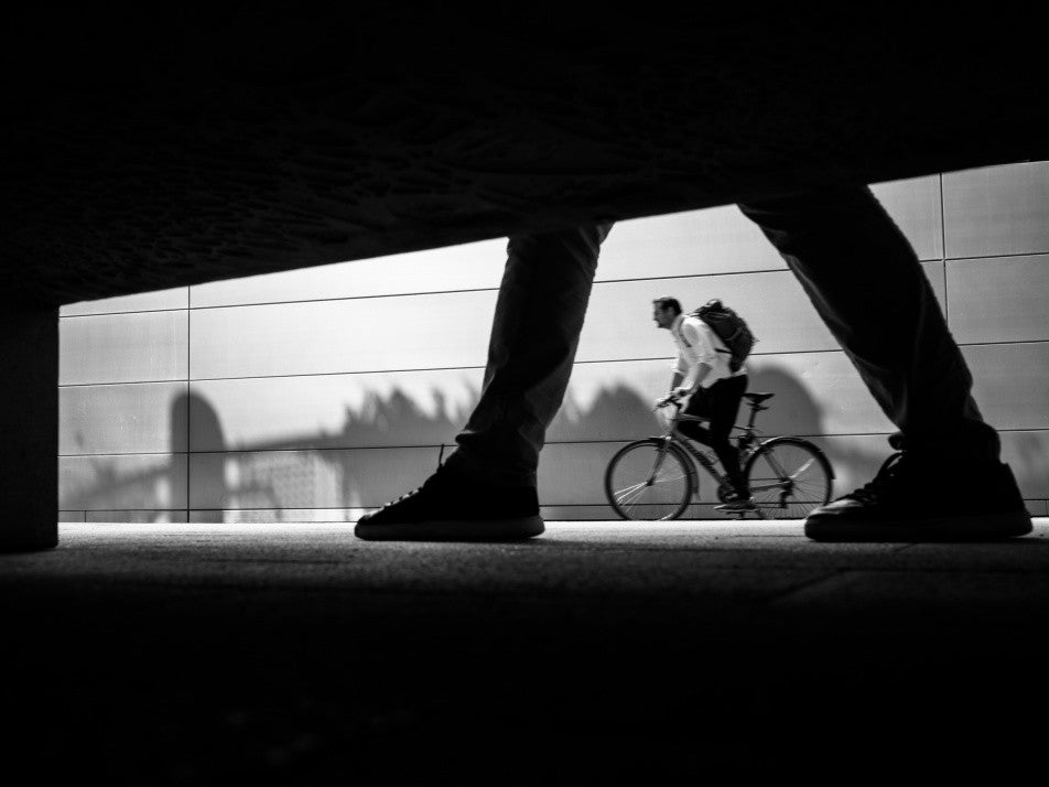 Caught in Motion: Legs, Feet, and a Bike