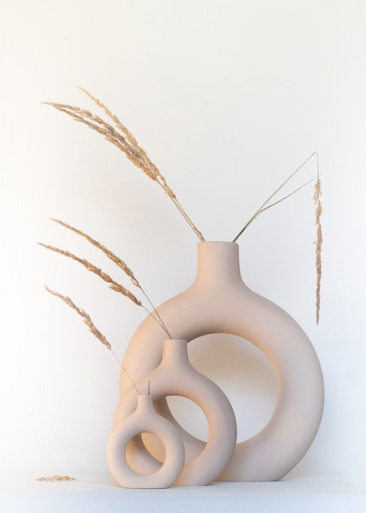 Ornamental grass in ring vases