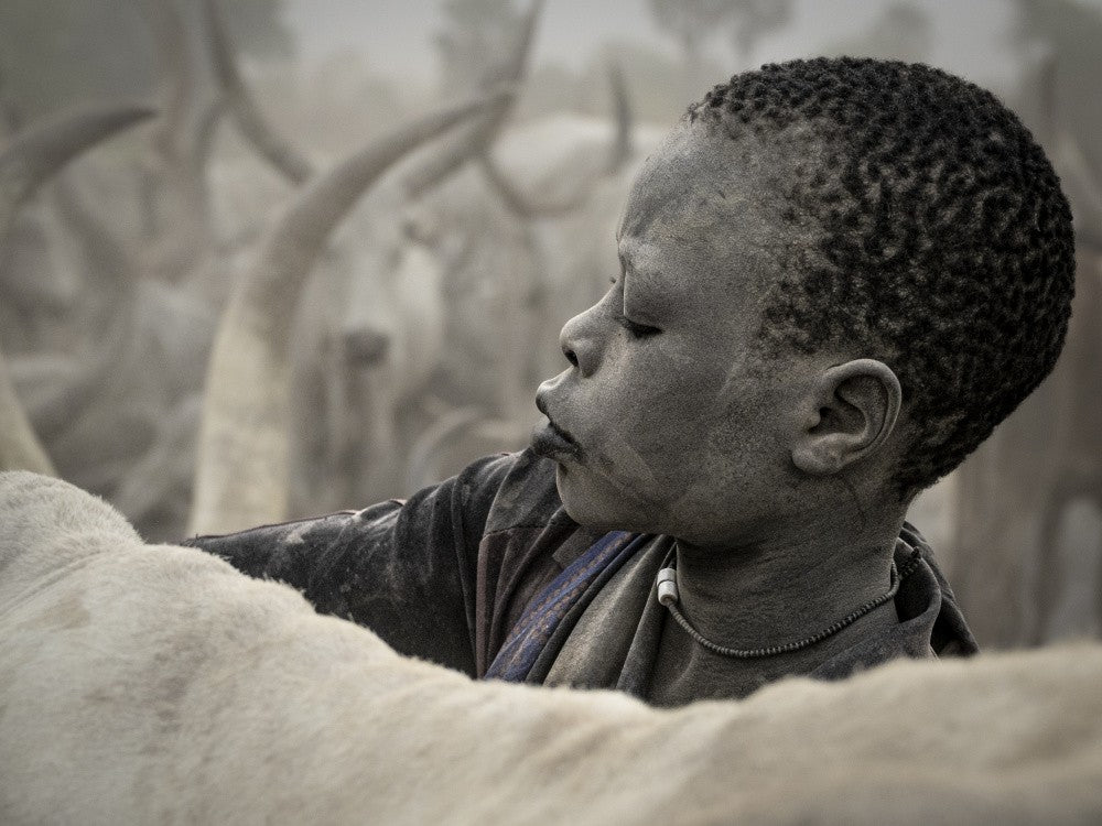 young boy at a Mundari camp, South Sudan