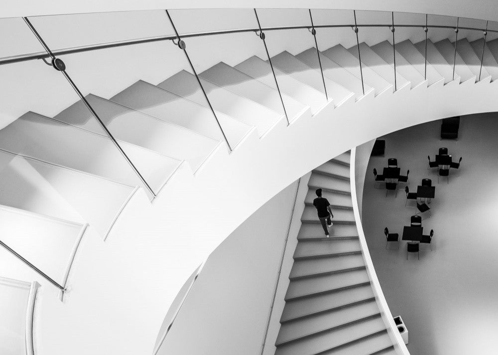 Under the white stairs