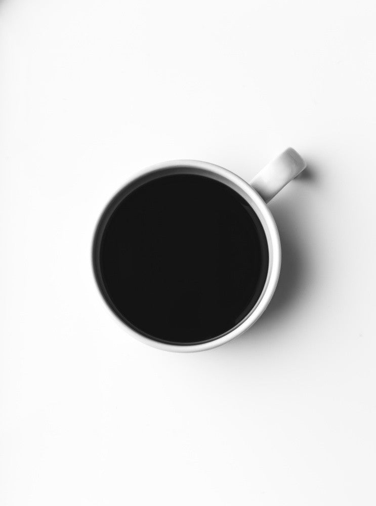 Black Coffee Set  Against A  Stark White Background