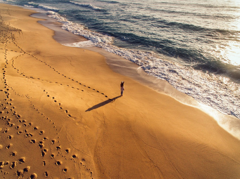 Promenade solitaire sur la plage