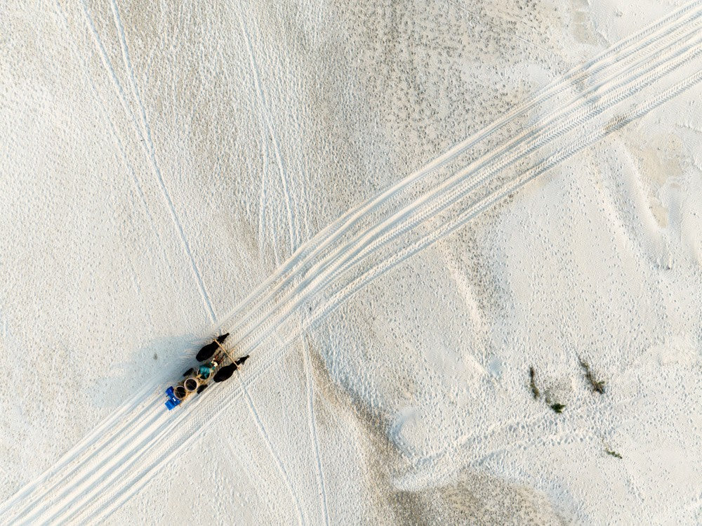 Through the white sand