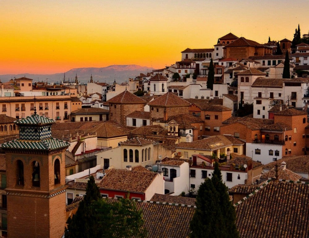 Sunset Over A Historic Spanish Cityscape