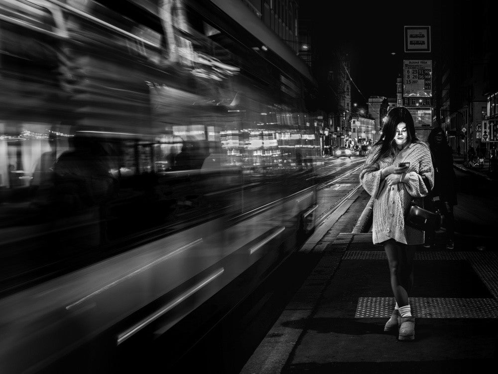 Tram stop at night