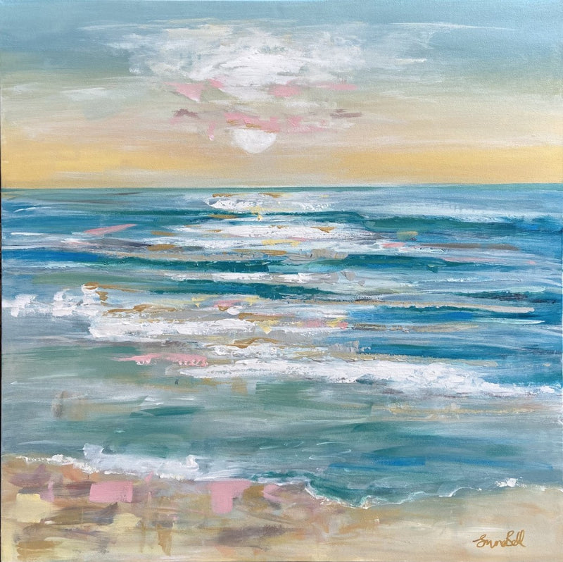 A Tranquil Ocean Under a Sky at Sunrise