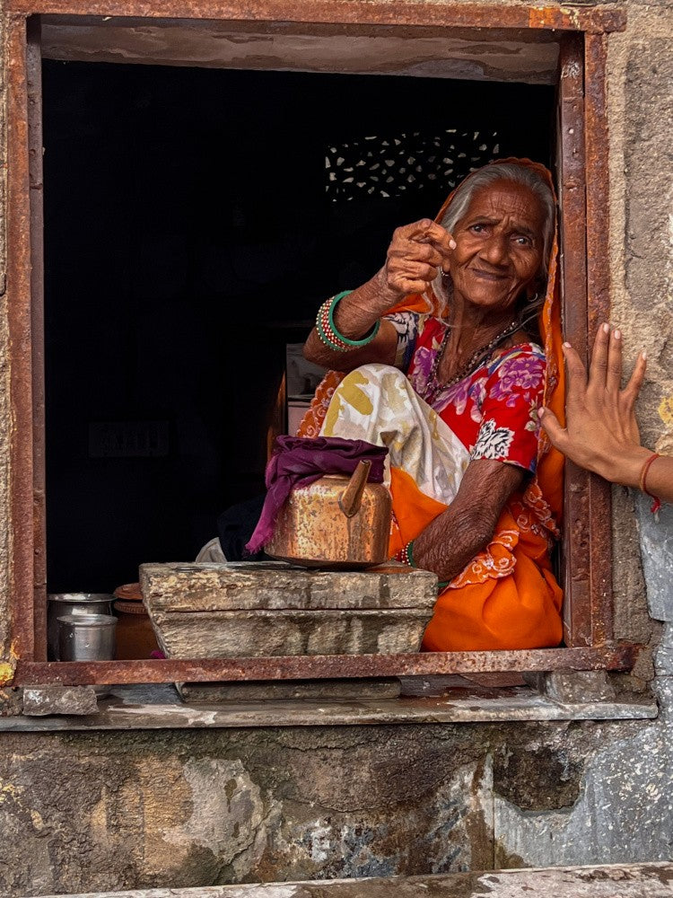 Through Her kitchen  Window