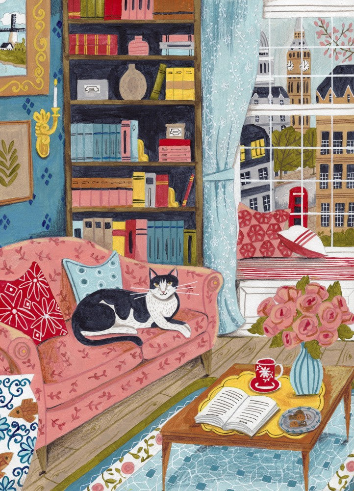 Cat on sofa in London pastel colours