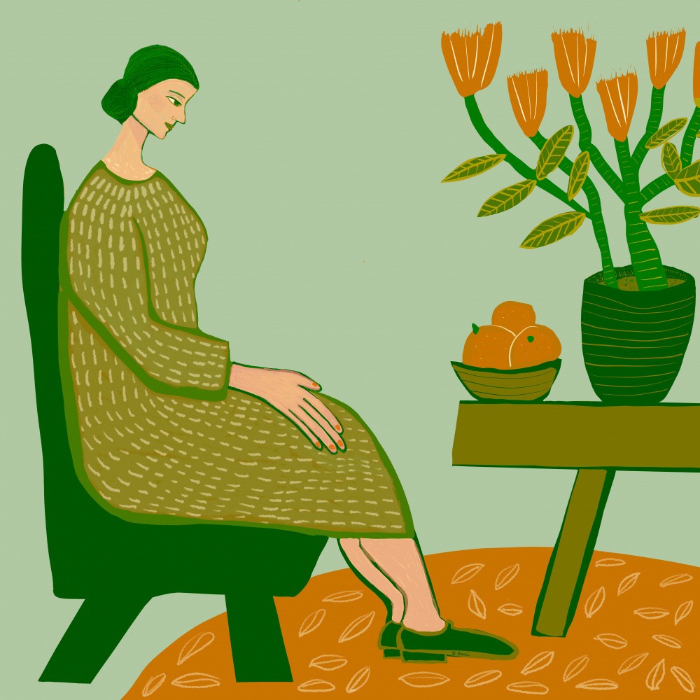 Woman sitting with pot plant