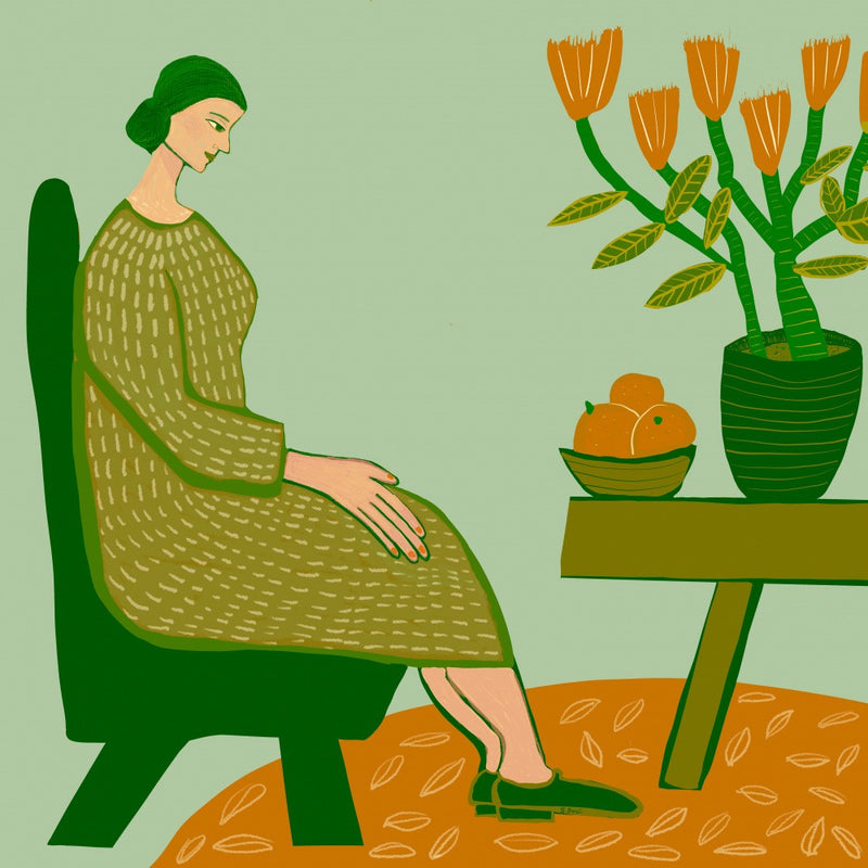 Femme assise avec plante en pot