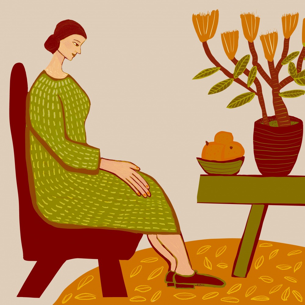 Woman sitting with pot plant