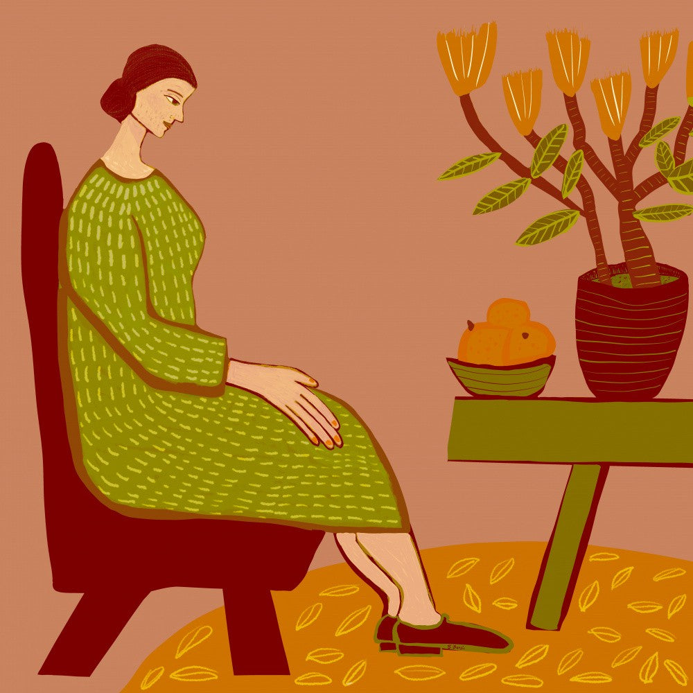 Woman sitting with pot plant