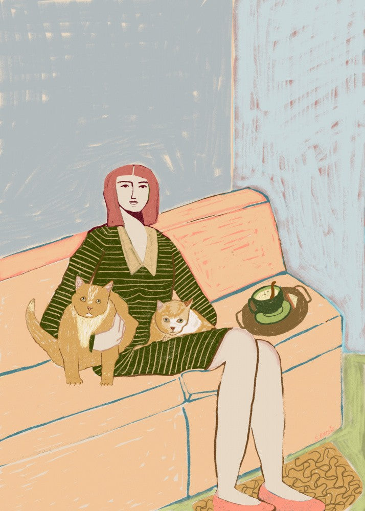 Katzenliebhaberin auf dem Sofa