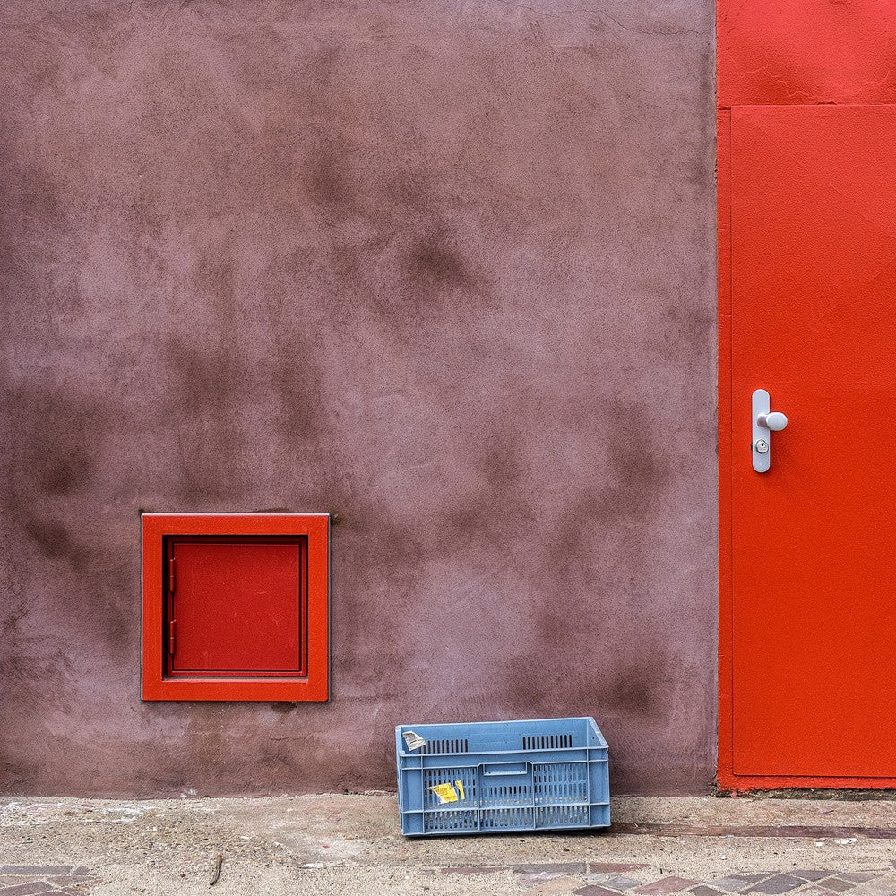 Composition with a blue crate