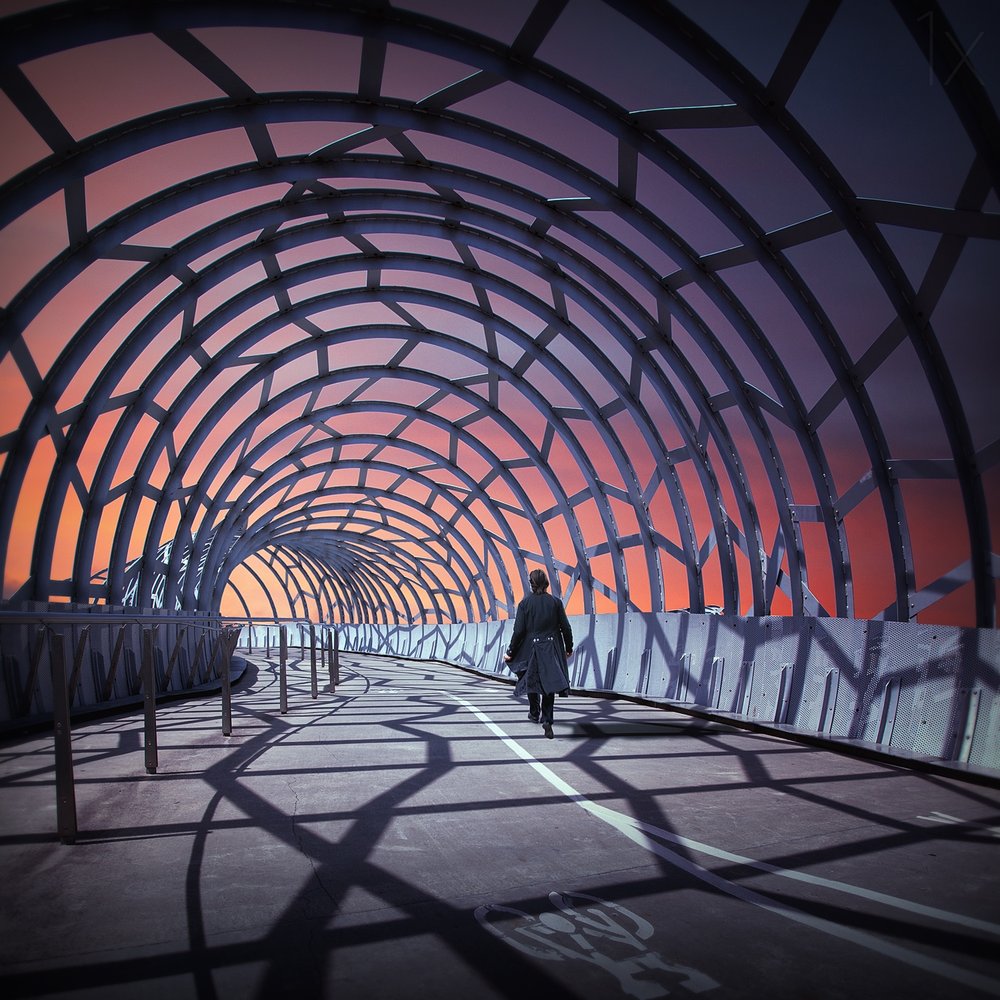 Solitary Walk Through Arches