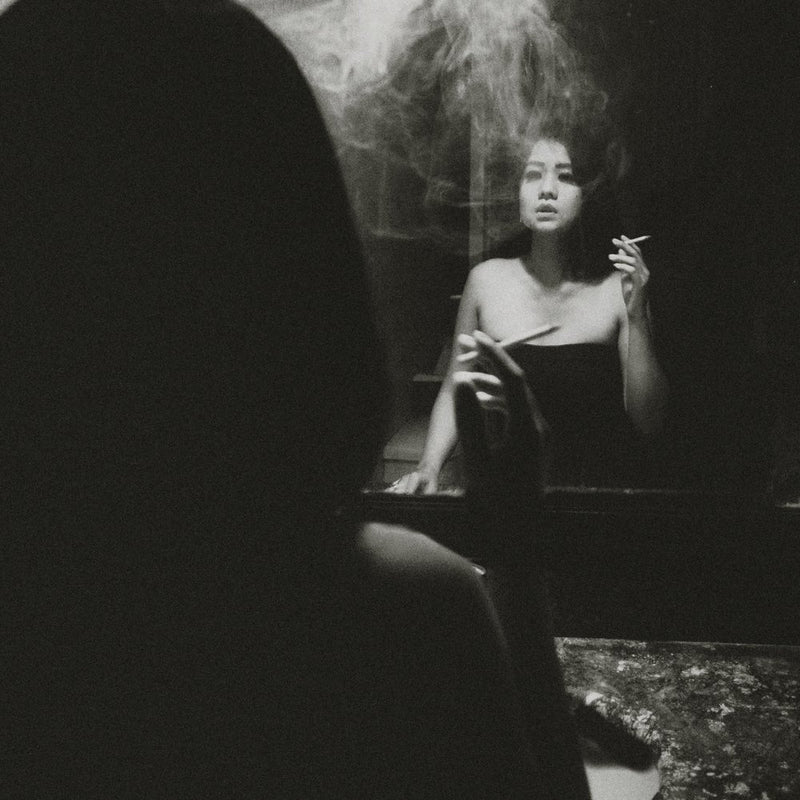 Pensive Woman Smoking