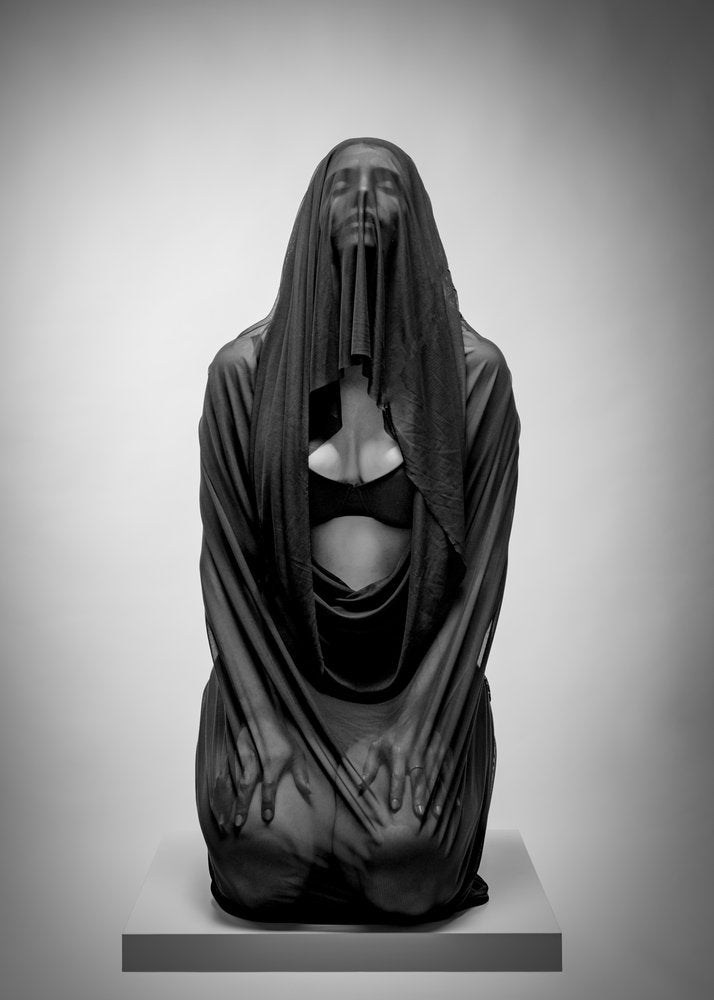 Veiled Kneeling Figure
