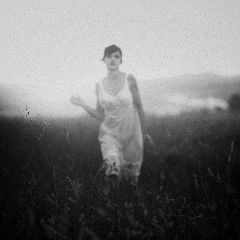 Dreamy Woman in Field