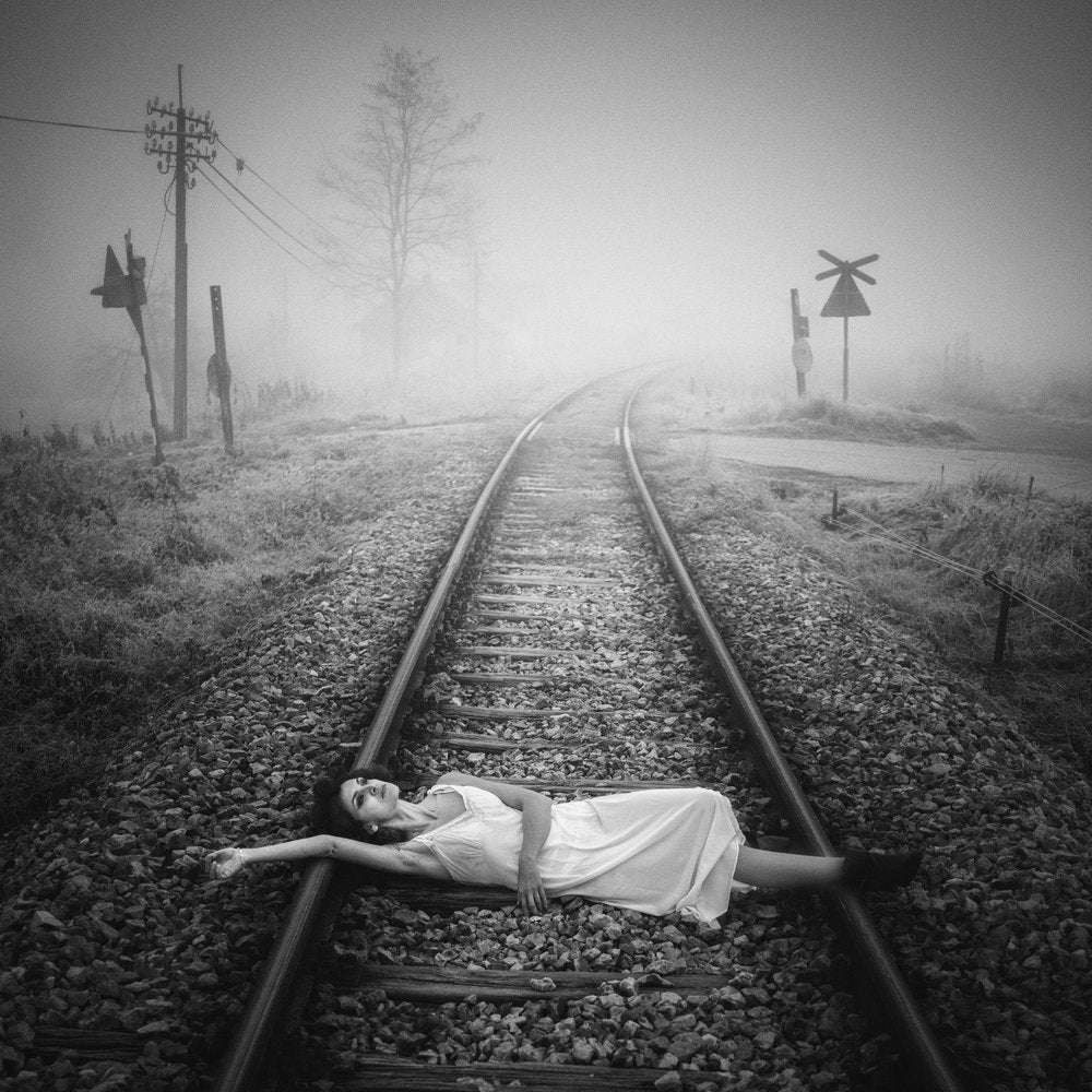 Woman on Misty Tracks