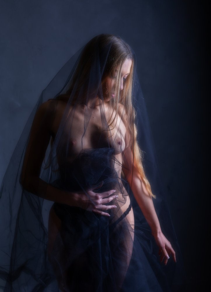Ethereal Veiled Woman
